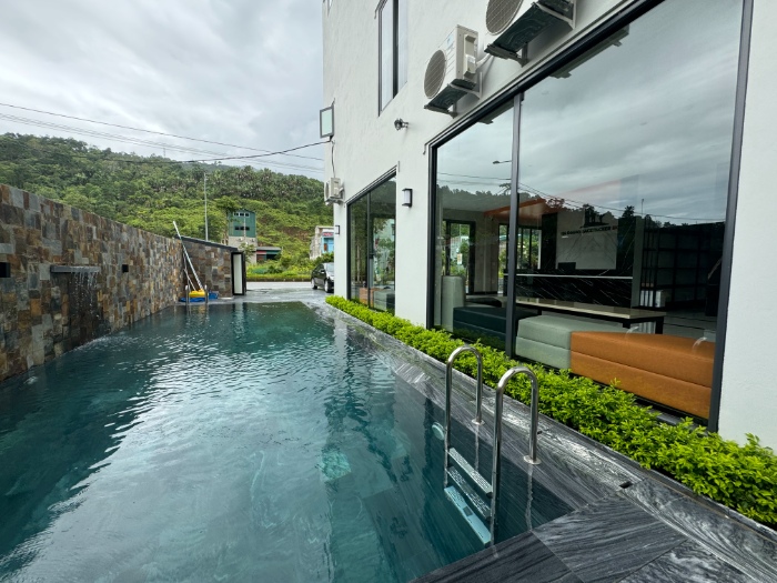 Large swimming pool at Ha Giang Hostel